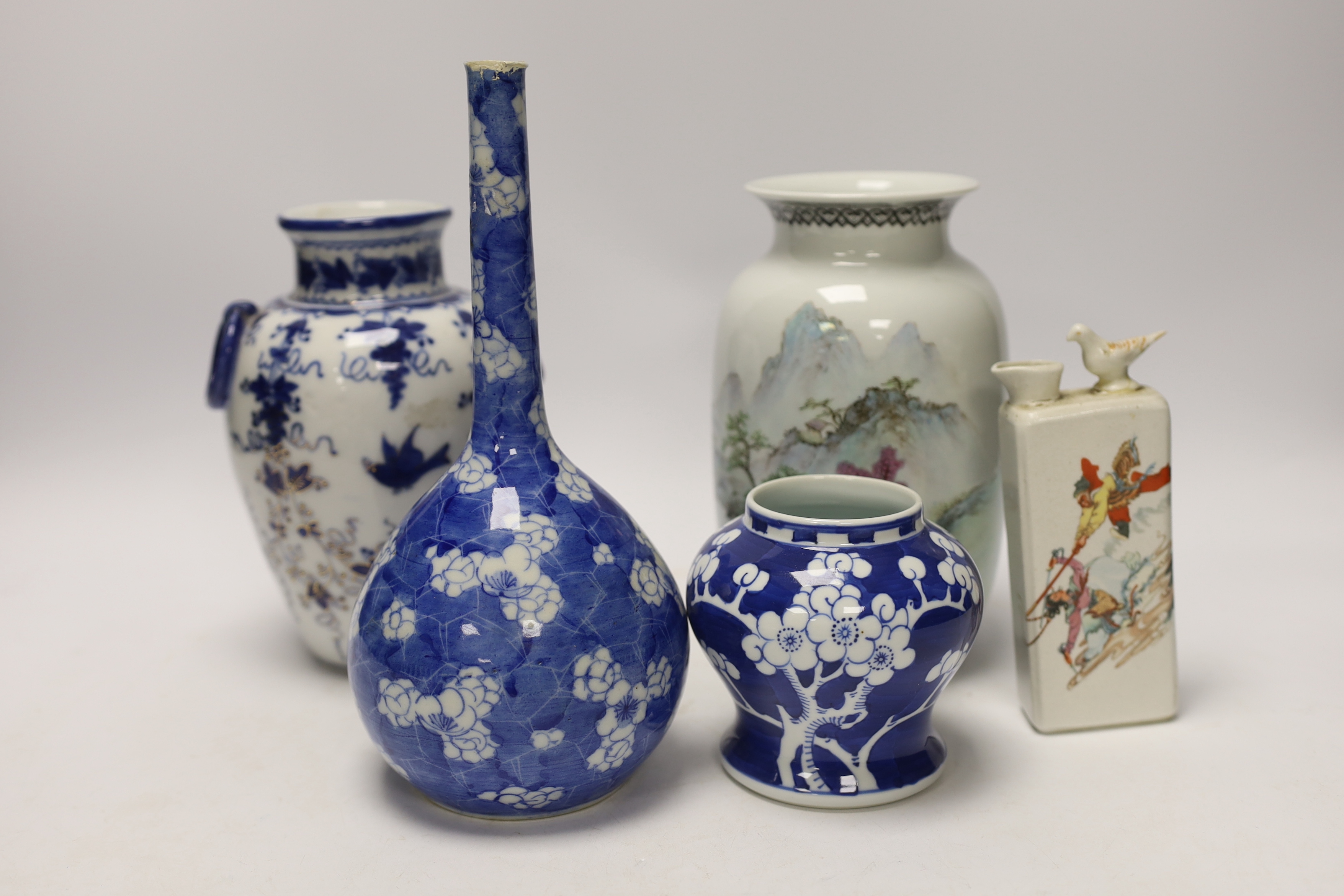 A collection of Chinese and Japanese ceramics, including a blue and white prunus flower baluster jar, largest 24cm high (6)